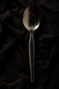 High angle view of fork on table