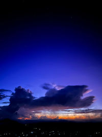 Scenic view of sea against sky at night