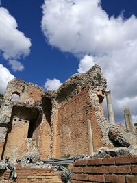 Low angle view of old ruins against sky