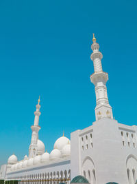 Low angle view of building against blue sky