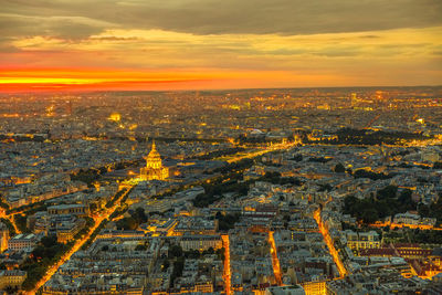 Aerial view of city buildings during sunset