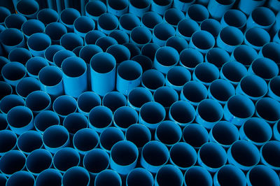 Full frame shot of blue plastic pipes