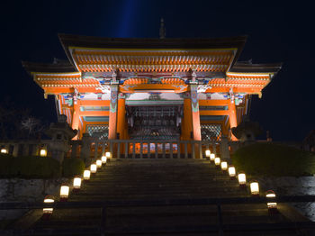 Low angle view of illuminated temple at night