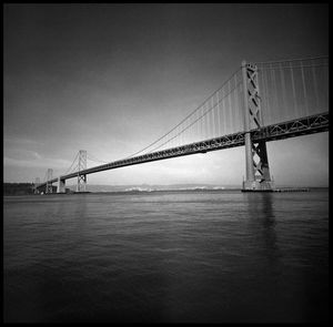 View of suspension bridge over river