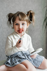 Cute girl sitting at home