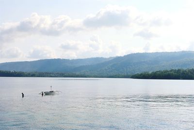 Scenic view of wishing island against sky