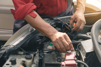 Man working in car