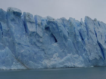 Scenic view of frozen sea against sky