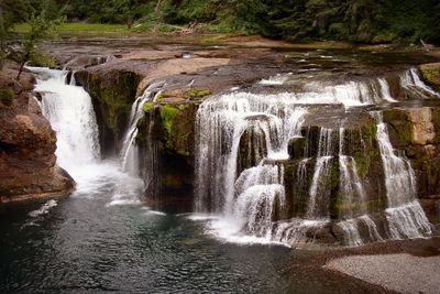 View of waterfall in forest