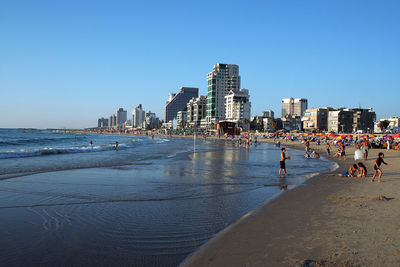View of cityscape against clear sky