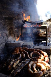 Close-up of meat on barbecue grill