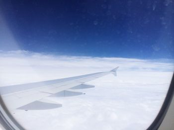 Cropped image of airplane wing