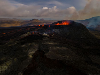 Scenic view of volcanic landscape against sky