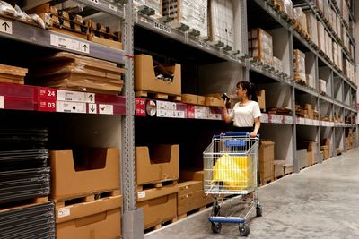 Young woman working at warehouse