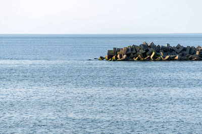 Scenic view of sea against clear sky