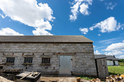 Low angle view of old building against sky