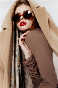 Portrait of young woman wearing sunglasses