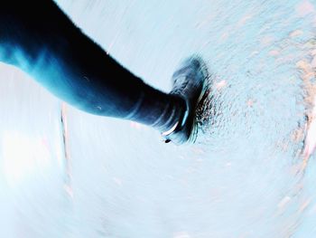 Close-up of person swimming in sea