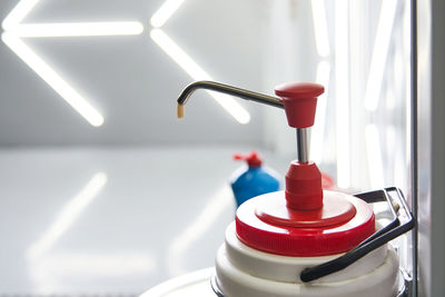 Close-up of faucet in bathroom