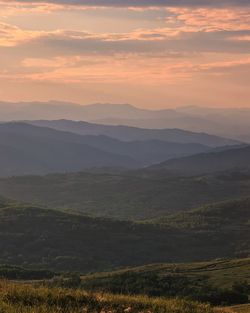 Scenic view of landscape against sky during sunset