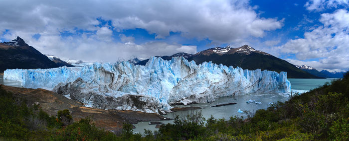 Panoramic view of snowcapped mountain against sky