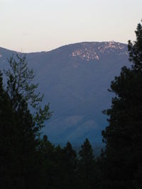 Scenic view of silhouette mountains against clear sky