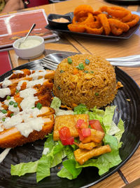 High angle view of food served on table