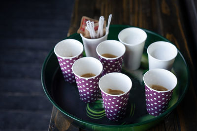 High angle view of  paper coffee cups on table