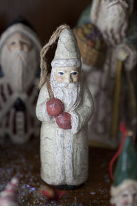 Close-up of figurine on table