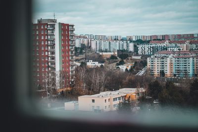 High angle view of buildings against sky