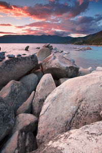 Scenic view of sea against sky at sunset