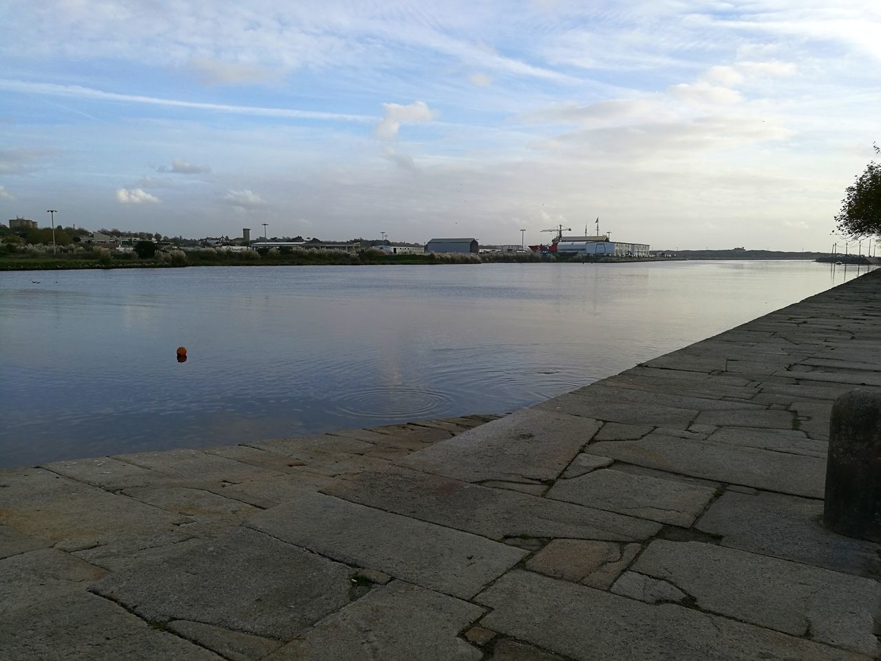 SCENIC VIEW OF WATER AGAINST SKY