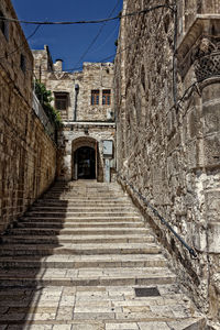 Steps leading towards historic building in city