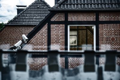 Low angle view of house roof