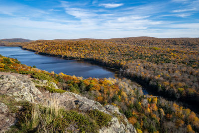 Scenic view of lake against sky during autumn