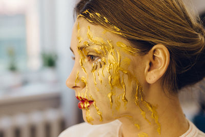 Close-up portrait of young woman