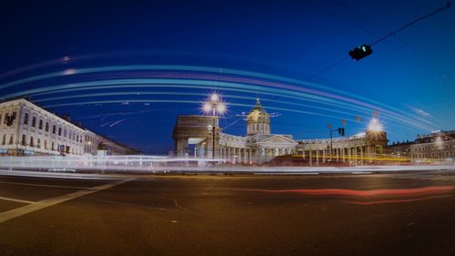 View of illuminated street lights at night