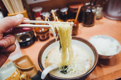 Close-up of hand holding food