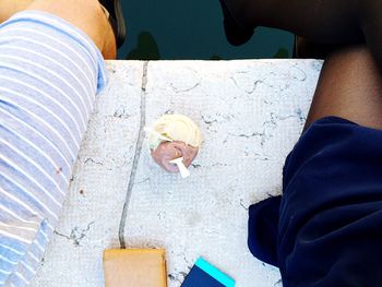 High angle view of people on hand