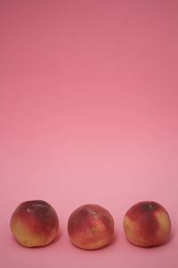 Close-up of fruits against white background