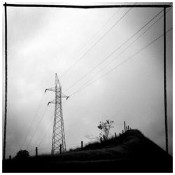 Electricity pylon against sky