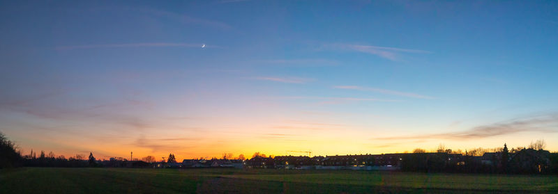 Scenic view of silhouette landscape against sky during sunset