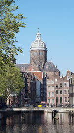 Beautiful architecture european style building over canel and bridge amsterdam netherland