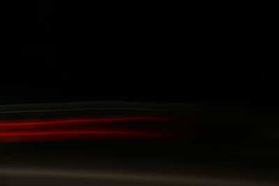 Blurred motion of illuminated lights at night