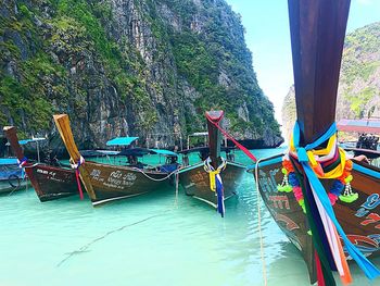 Boats moored in sea