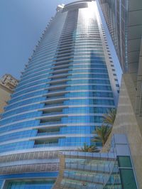 Low angle view of modern building against clear sky