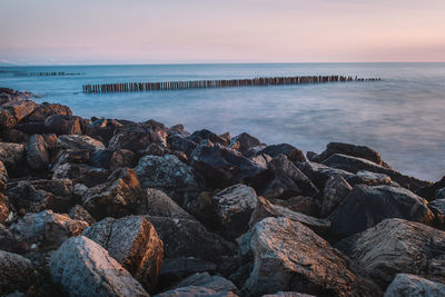 Scenic view of sea against sky during sunset