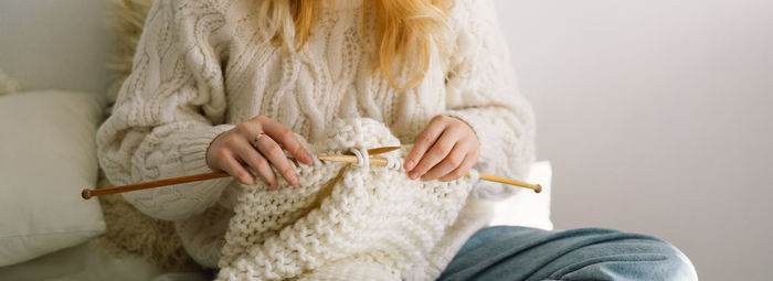 Teengirl knitting at home. handmade and hobby.