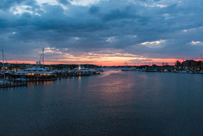 View of harbor at sunset