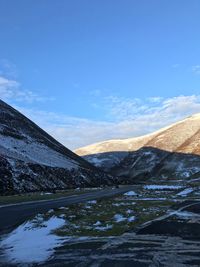 Scenic view of landscape against sky during winter